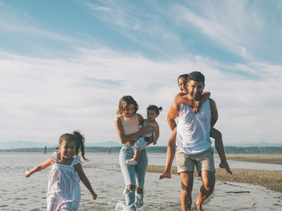 Family walking on beach